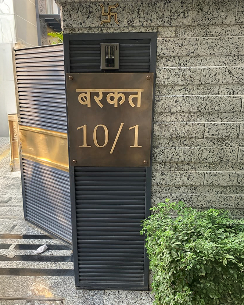 Ornate traditional copper name plate